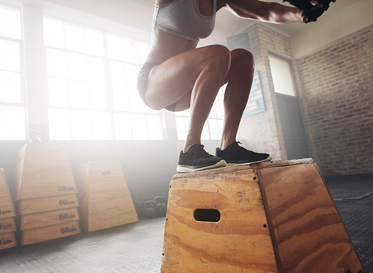 lady jumping on a block. training at pro-active physio