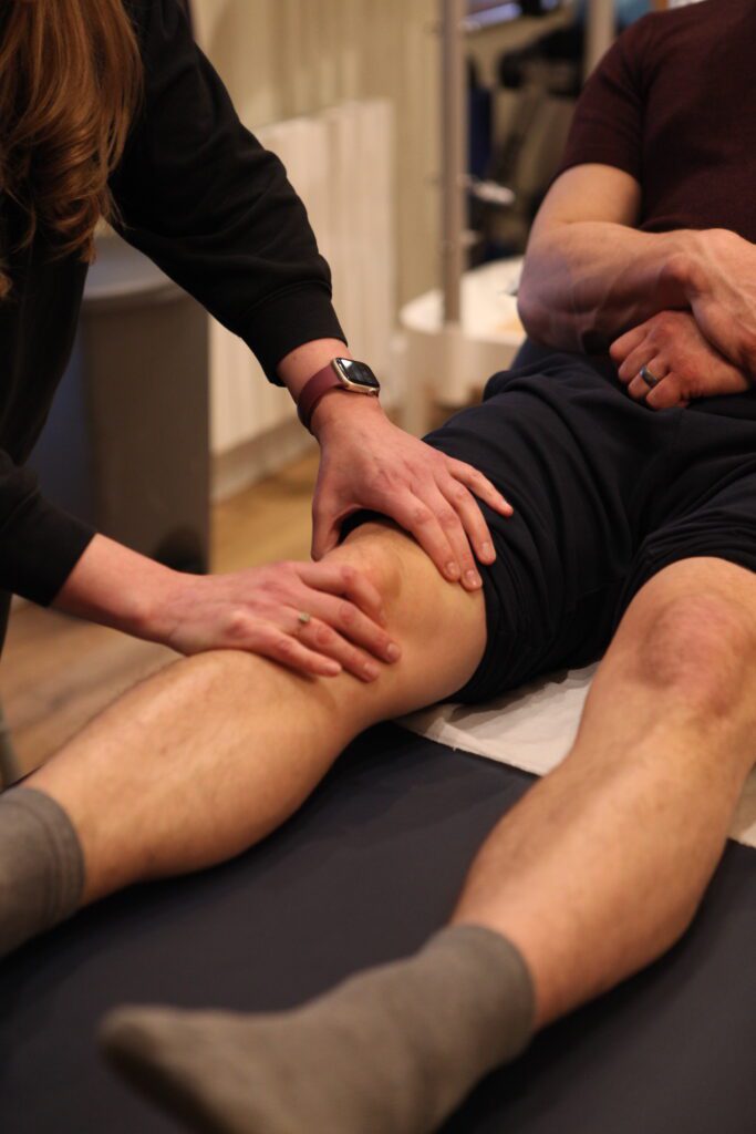 Physio treating arthritic knee at Pro-active physio and pilates Tewkesbury. Soft tissue release to ITB. 