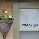 Photo of hanging basket outside pro-active physio and pilates clinic Tewkesbury