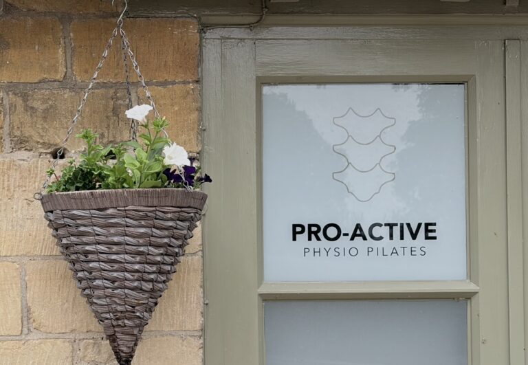 Photo of hanging basket outside pro-active physio and pilates clinic Tewkesbury