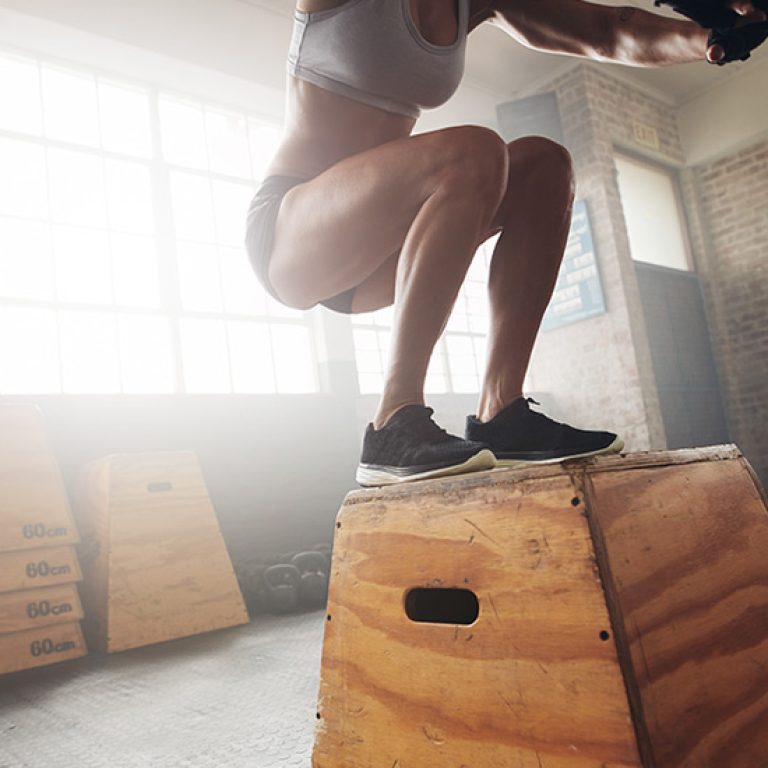 lady jumping on a block. training at pro-active physio